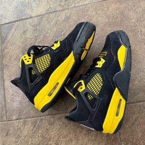 Air Jordan 4 Retro Black and Yellow Sneakers